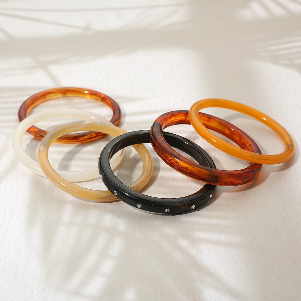 Resin Bangle Set in Amber, Cream, and Black - Picture 2 of 4